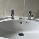 fixing taps in a sink